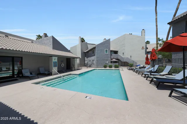 a view of a house with sitting area and furniture