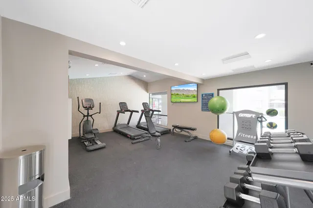 a view of a room with gym equipment