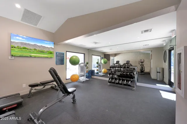 a view of a room with gym equipment