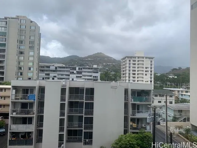 a view of a city with tall buildings