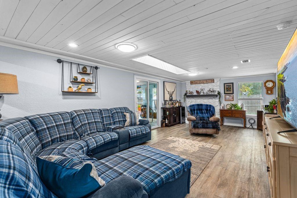 925 Flagler Avenue Edgewater, FL 32132 - Photo 15 of 35 a living room with furniture and a couch