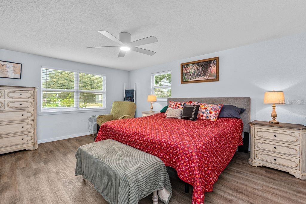 925 Flagler Avenue Edgewater, FL 32132 - Photo 18 of 35 a bedroom with a bed and a window