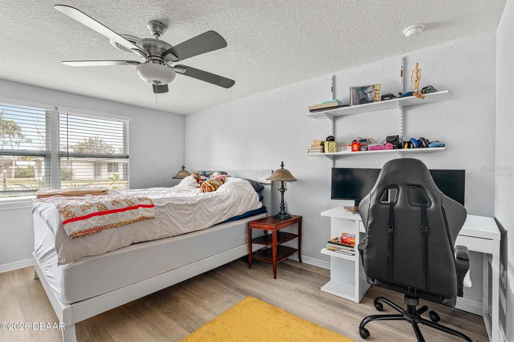 925 Flagler Avenue Edgewater, FL 32132 - Photo 21 of 35 a bedroom with bed and a window