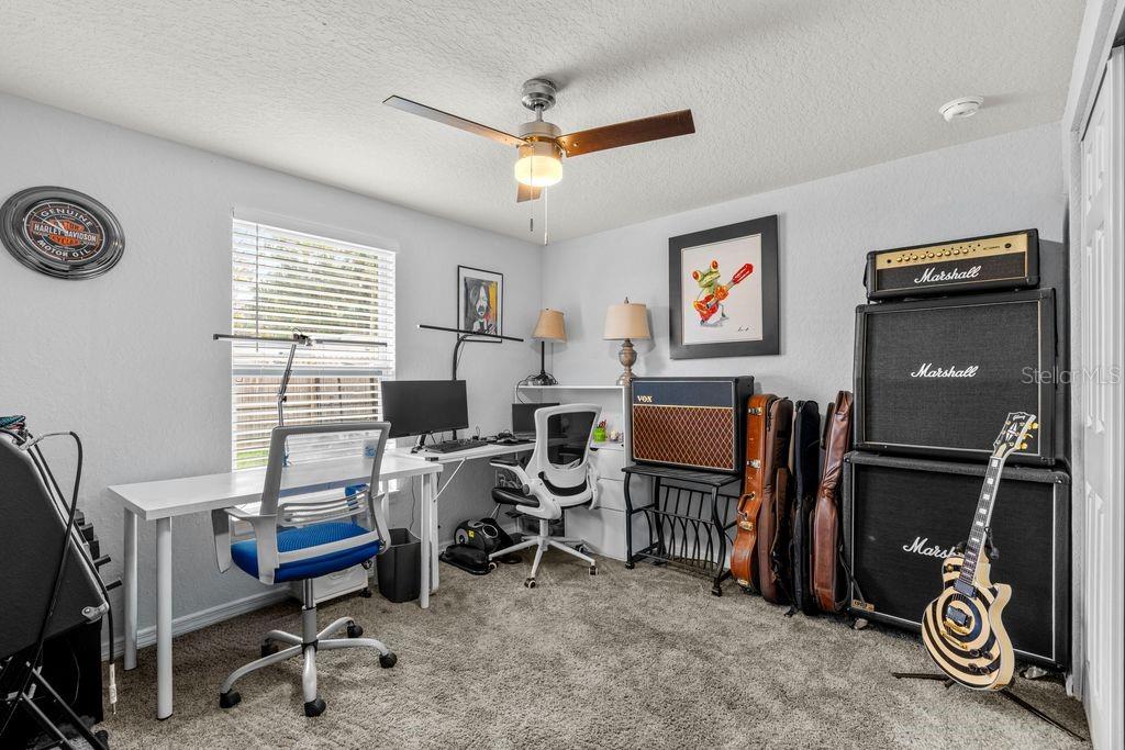 925 Flagler Avenue Edgewater, FL 32132 - Photo 22 of 35 a view of a workspace with furniture
