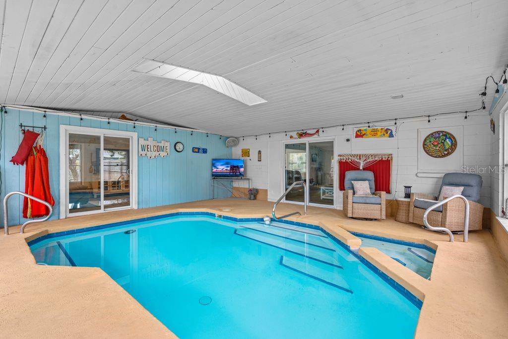 925 Flagler Avenue Edgewater, FL 32132 - Photo 28 of 35 a living room with furniture and flat screen tv