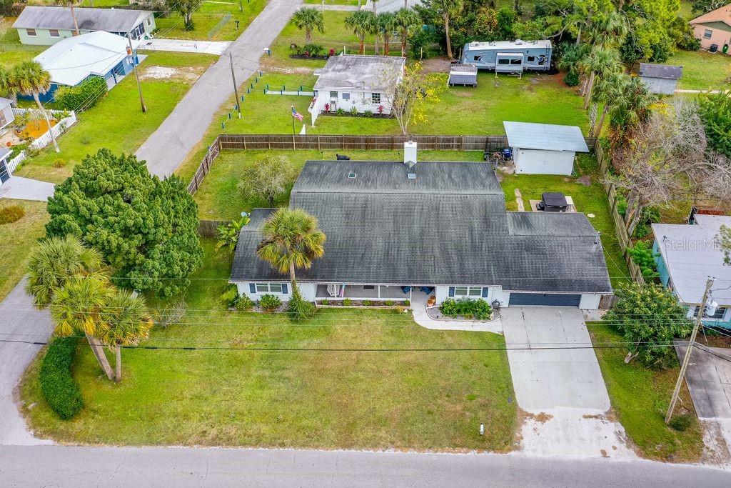 925 Flagler Avenue Edgewater, FL 32132 - Photo 33 of 35 a view of swimming pool with a garden