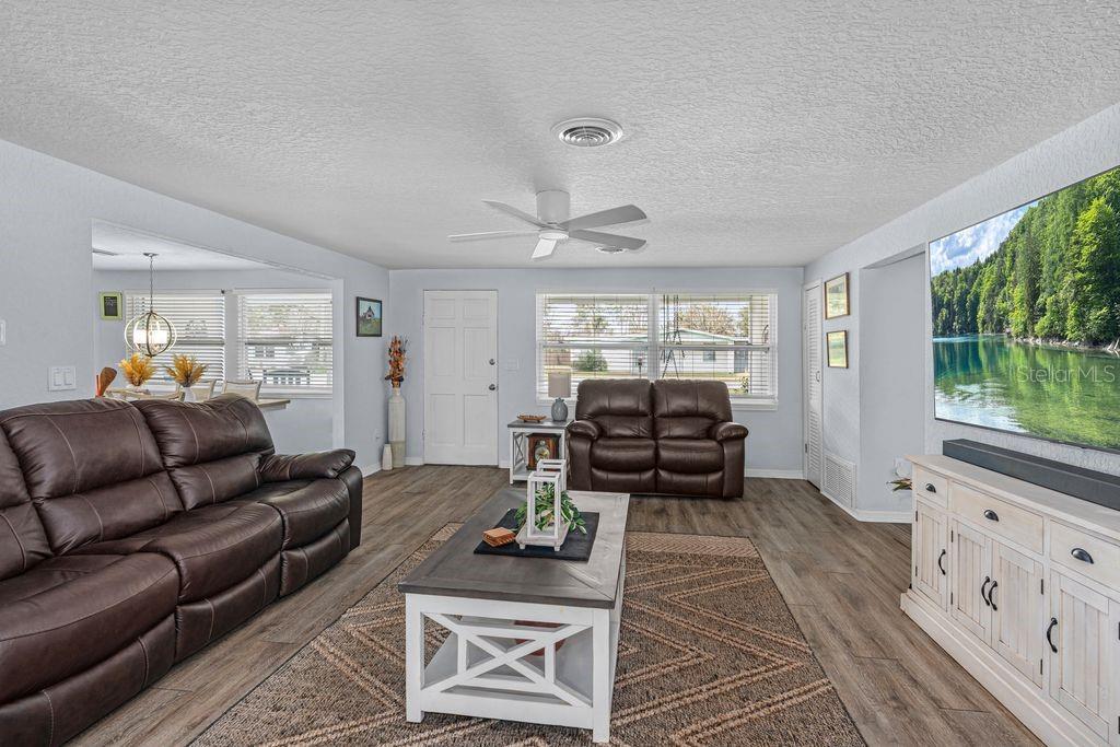 925 Flagler Avenue Edgewater, FL 32132 - Photo 10 of 35 a living room with furniture and a large window