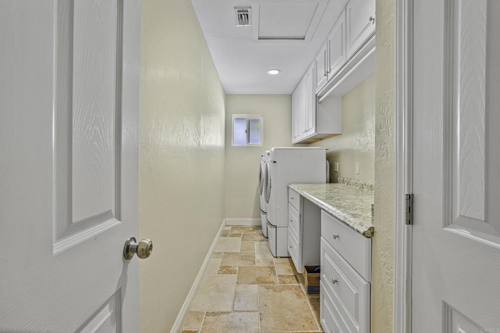 1460 Orpheus Avenue Encinitas, CA 92024 - Photo 13 of 24 a view of a kitchen from the hallway