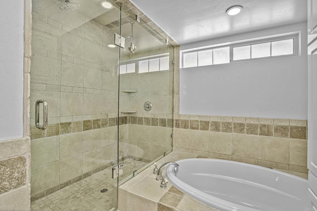 1460 Orpheus Avenue Encinitas, CA 92024 - Photo 19 of 24 a bathroom with a bathtub and shower