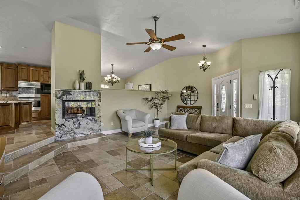 1460 Orpheus Avenue Encinitas, CA 92024 - Photo 2 of 24 a living room with furniture and wooden floor