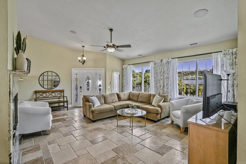 1460 Orpheus Avenue Encinitas, CA 92024 - Photo 3 of 24 a living room with furniture and a large window