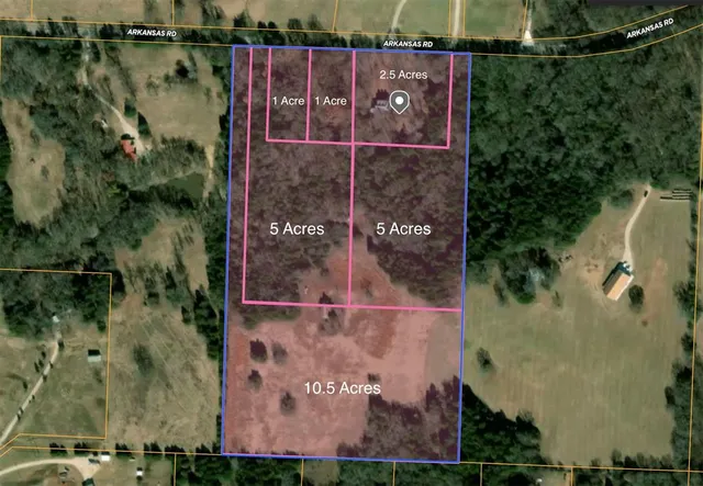 an aerial view of houses with outdoor space