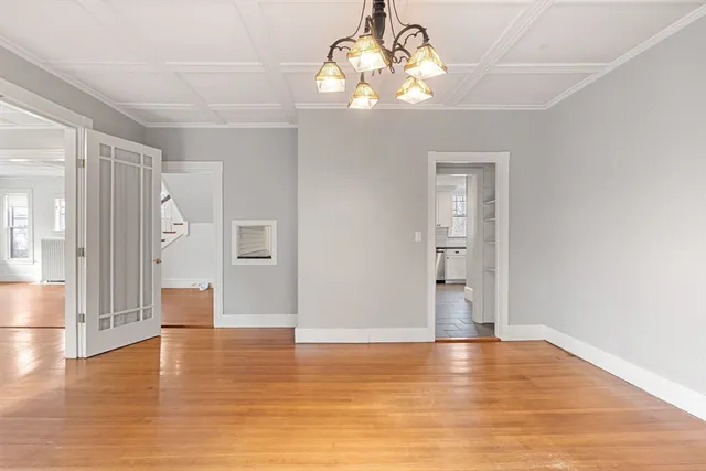 a view of a livingroom with wooden floor