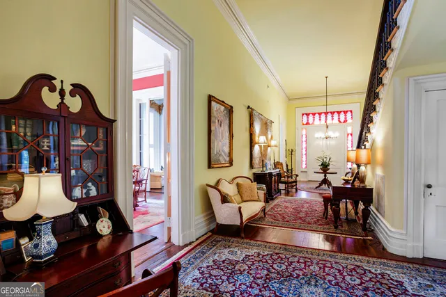 a living room with furniture fireplace and a fireplace
