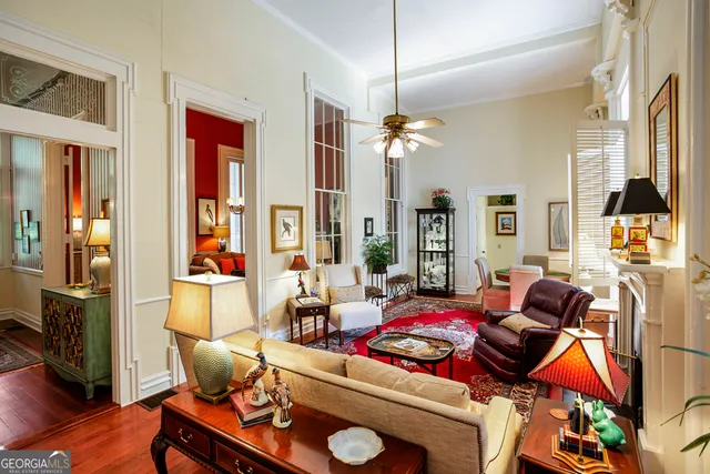 a living room with furniture and a window