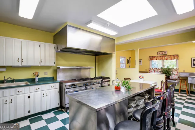 a bedroom with a bed and a fireplace