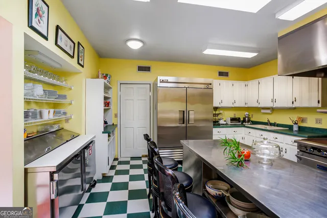 a living room with furniture fireplace and window