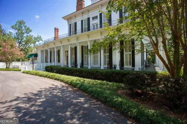 a aerial view of a house with garden
