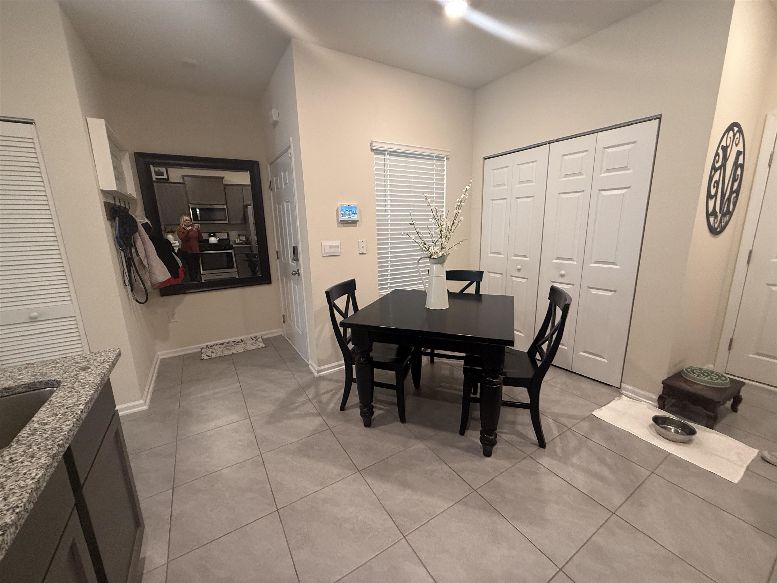 64 Coastline Way St. Augustine, FL 32092 - Photo 17 of 43 a view of a dining room with furniture