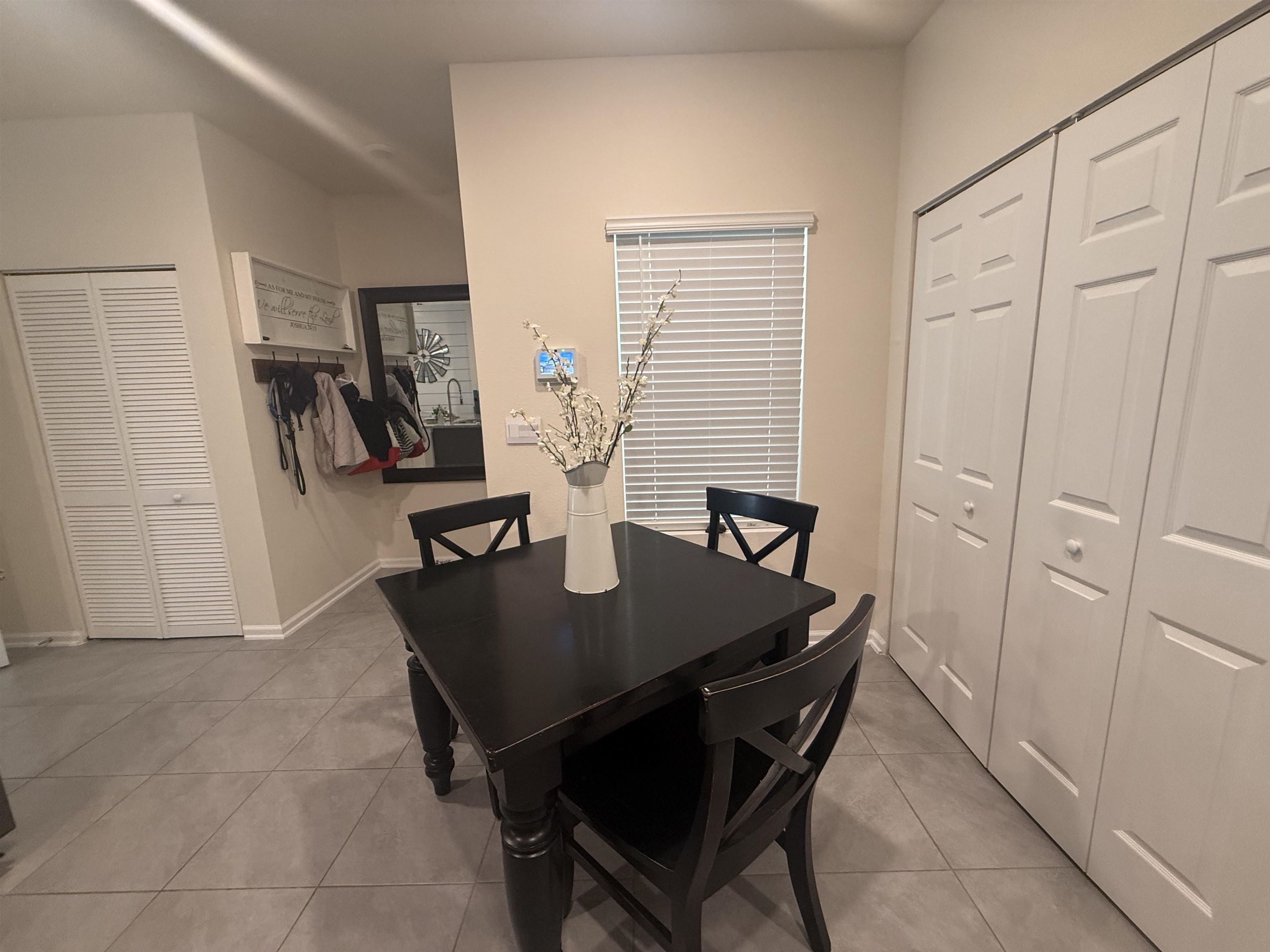 64 Coastline Way St. Augustine, FL 32092 - Photo 19 of 43 a view of table and chair in room