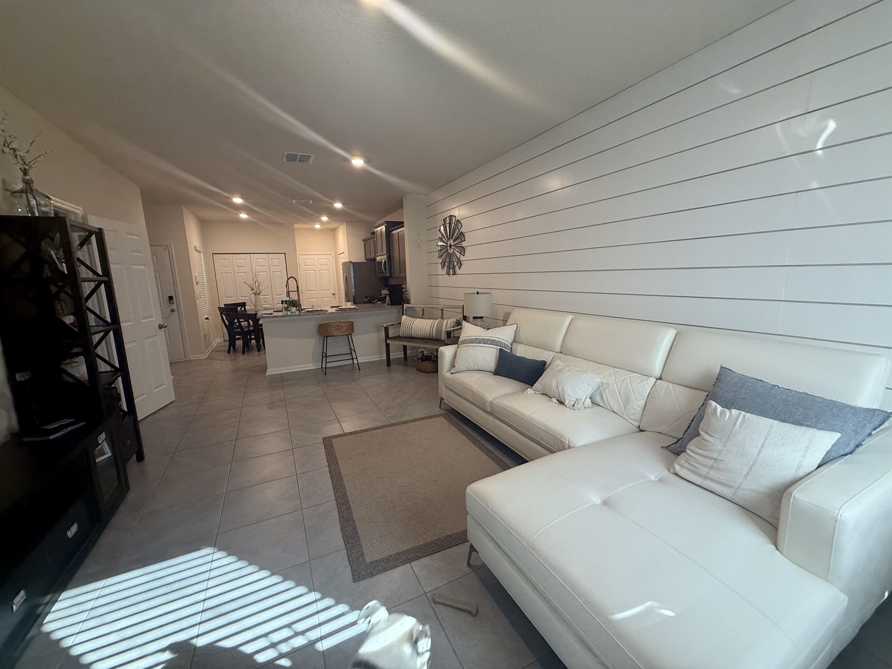 64 Coastline Way St. Augustine, FL 32092 - Photo 24 of 43 a living room with furniture and a rug