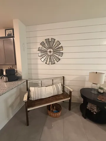 a bedroom with a bed and closet with lamp