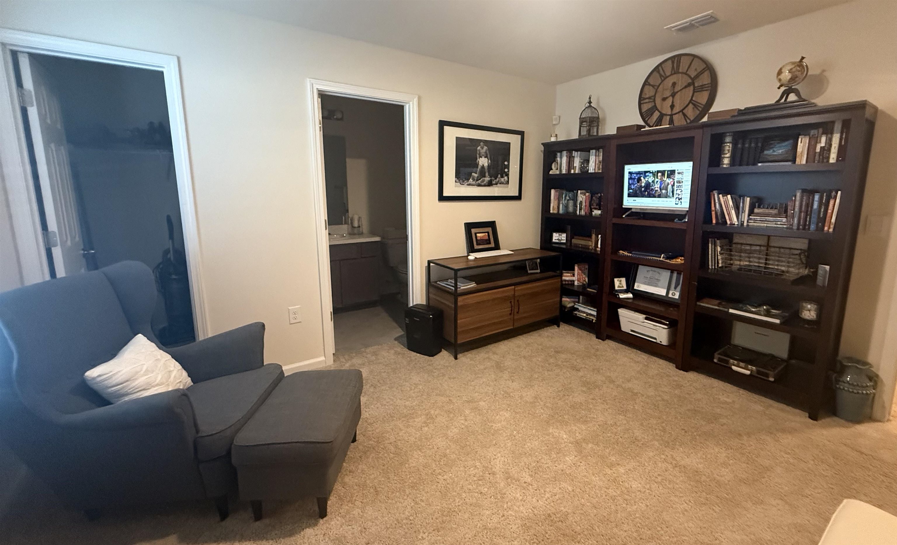 64 Coastline Way St. Augustine, FL 32092 - Photo 37 of 43 a living room with furniture cabinets and window