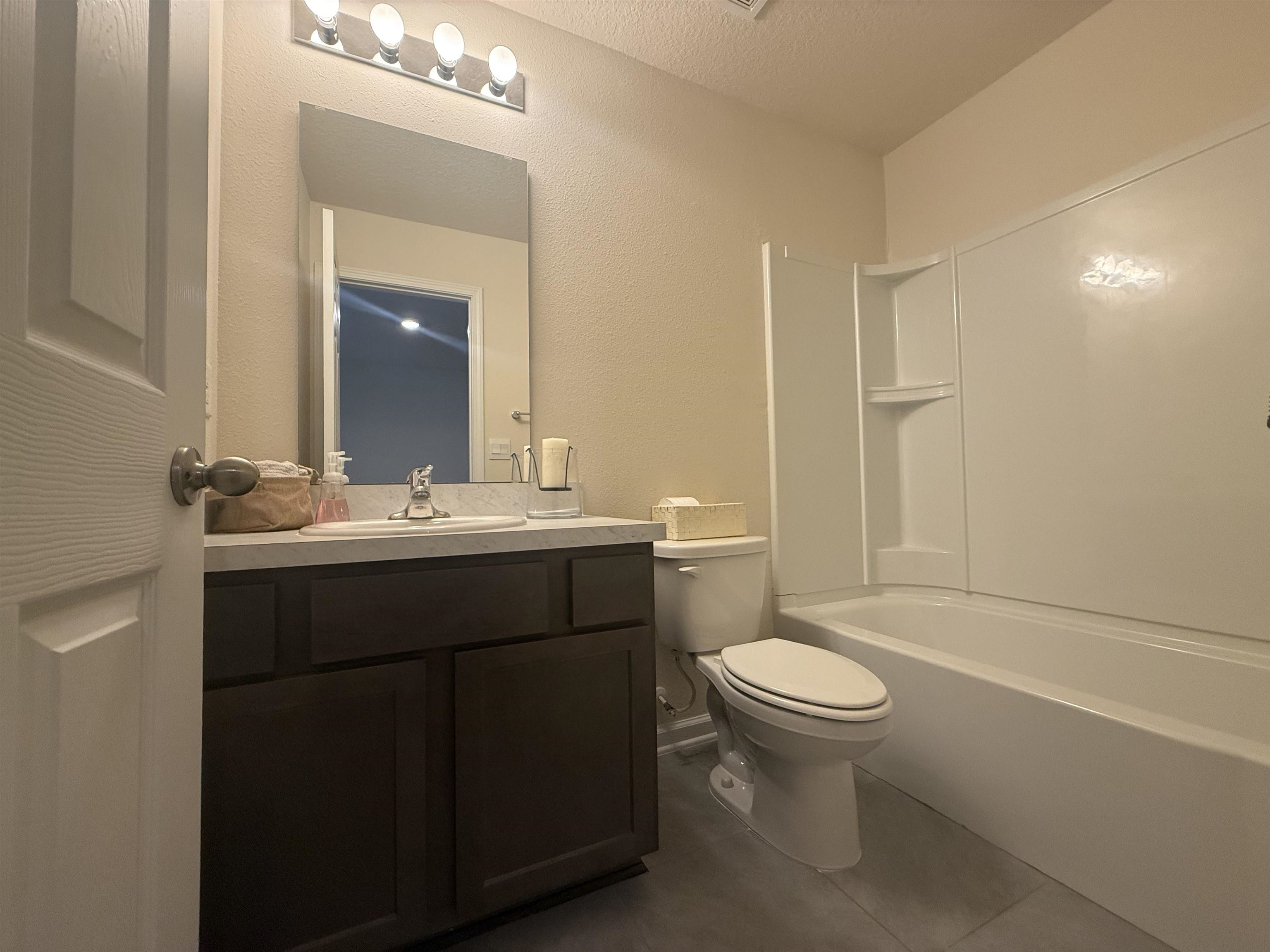 64 Coastline Way St. Augustine, FL 32092 - Photo 40 of 43 a bathroom with a sink toilet and a mirror