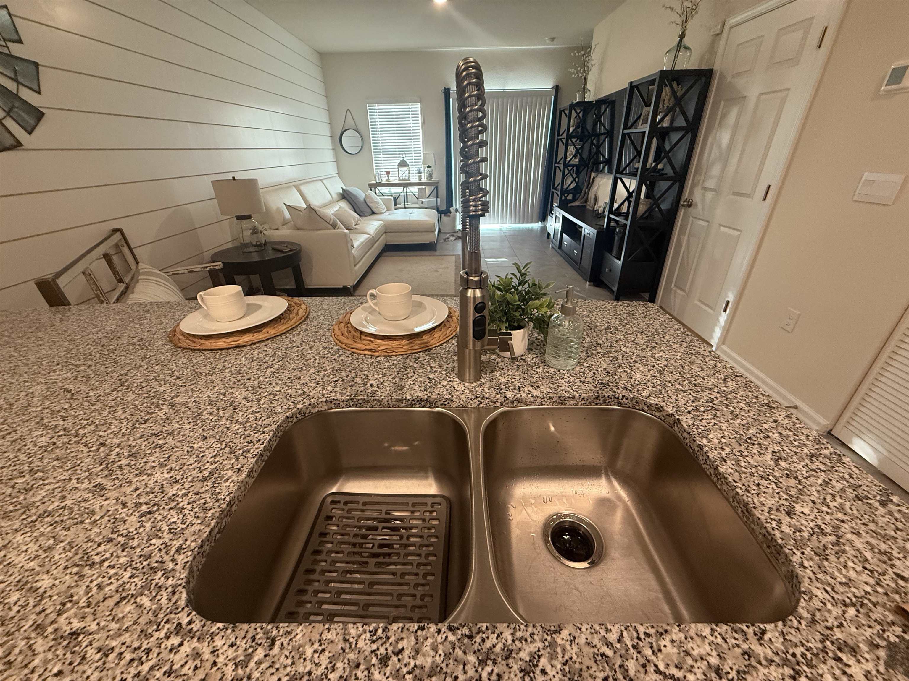64 Coastline Way St. Augustine, FL 32092 - Photo 5 of 43 a bathroom with a granite countertop sink and a mirror
