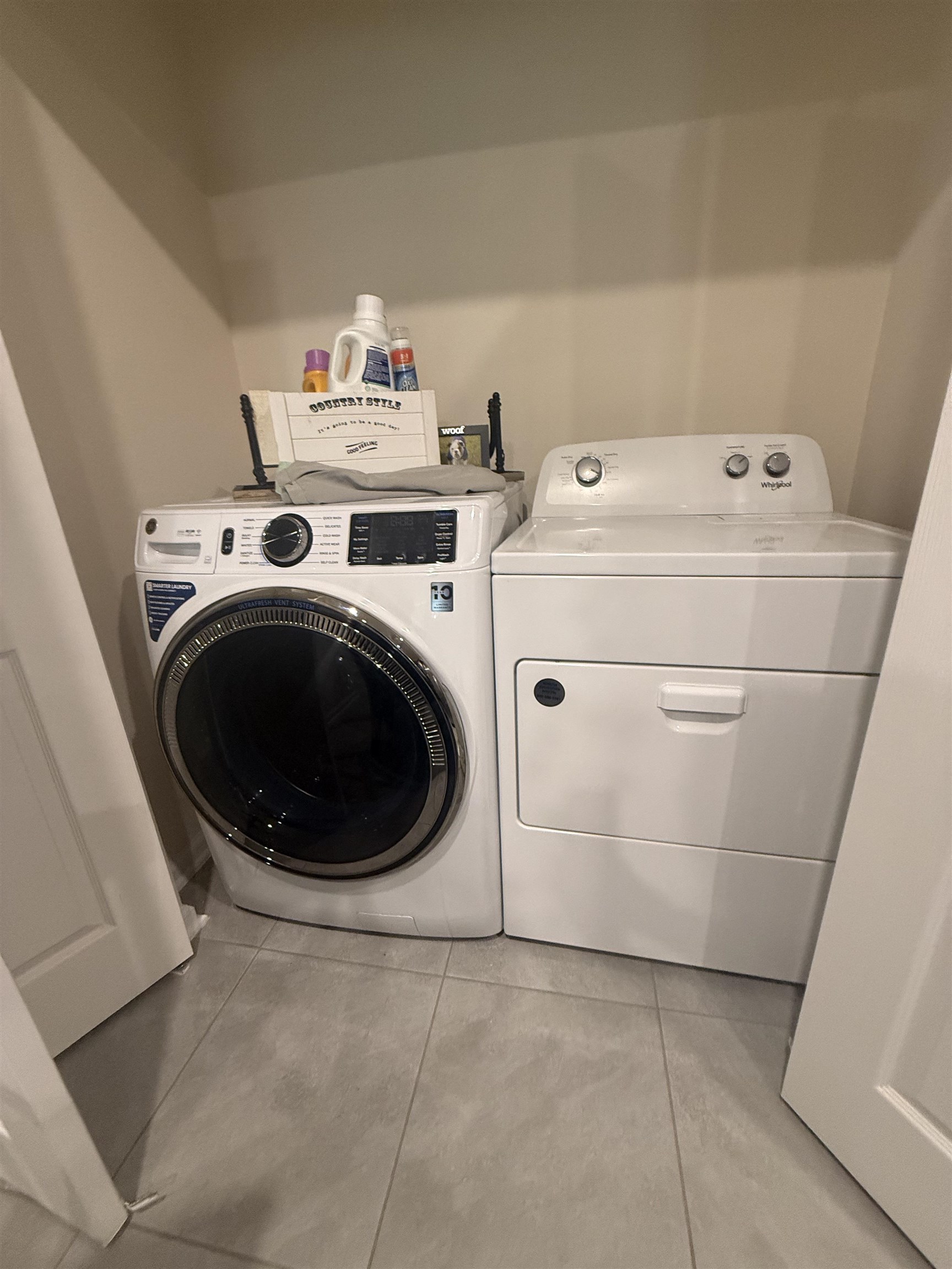 64 Coastline Way St. Augustine, FL 32092 - Photo 9 of 43 a utility room with dryer and washer