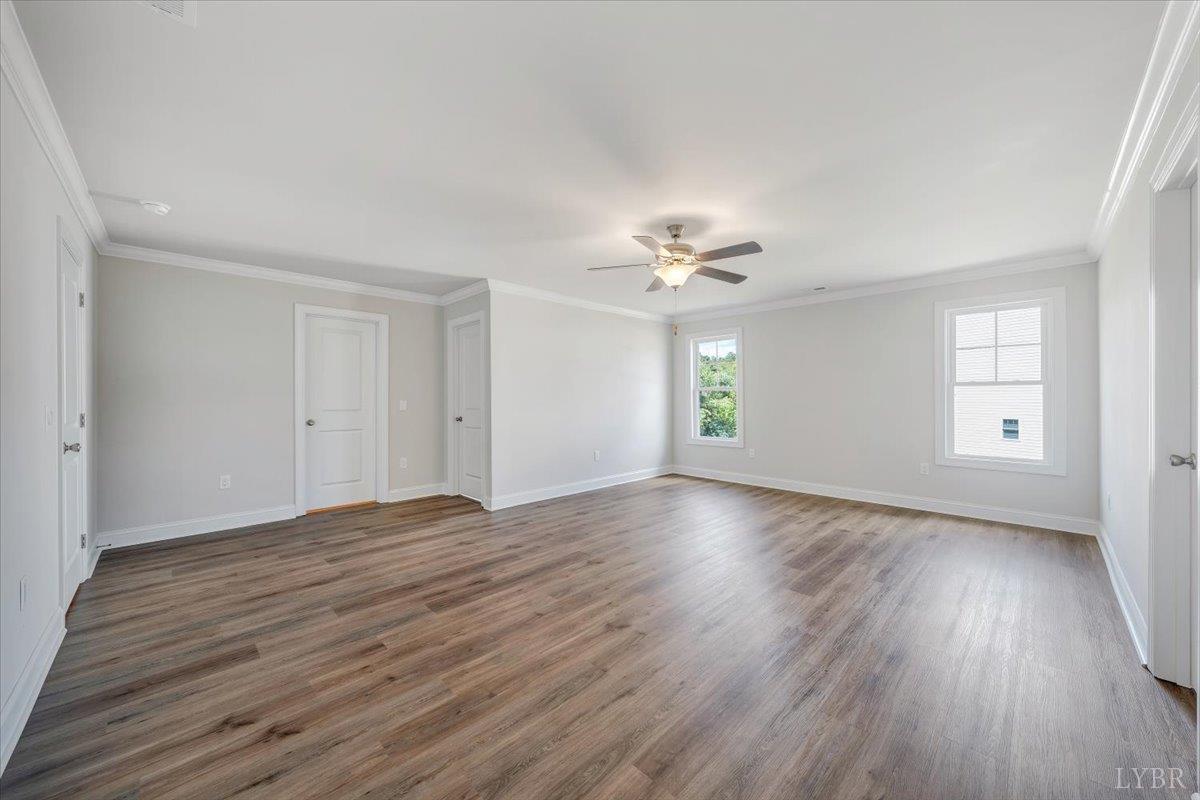 1053 Snowfield Circle Lynchburg, VA 24503 - Photo 14 of 29 a view of an empty room with wooden floor and window
