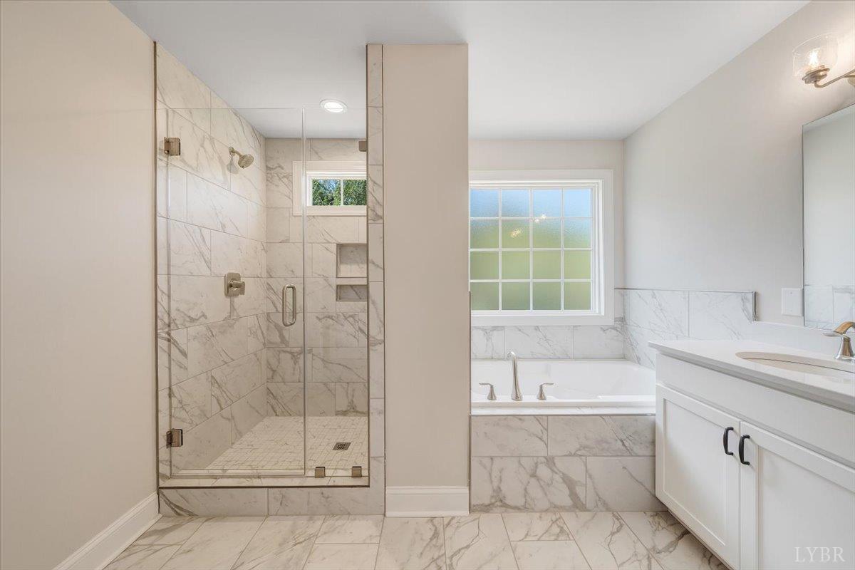 1053 Snowfield Circle Lynchburg, VA 24503 - Photo 17 of 29 a bathroom with a shower and a bathtub