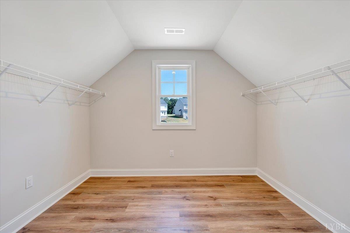 1053 Snowfield Circle Lynchburg, VA 24503 - Photo 18 of 29 a view of a room with wooden floor and white walls