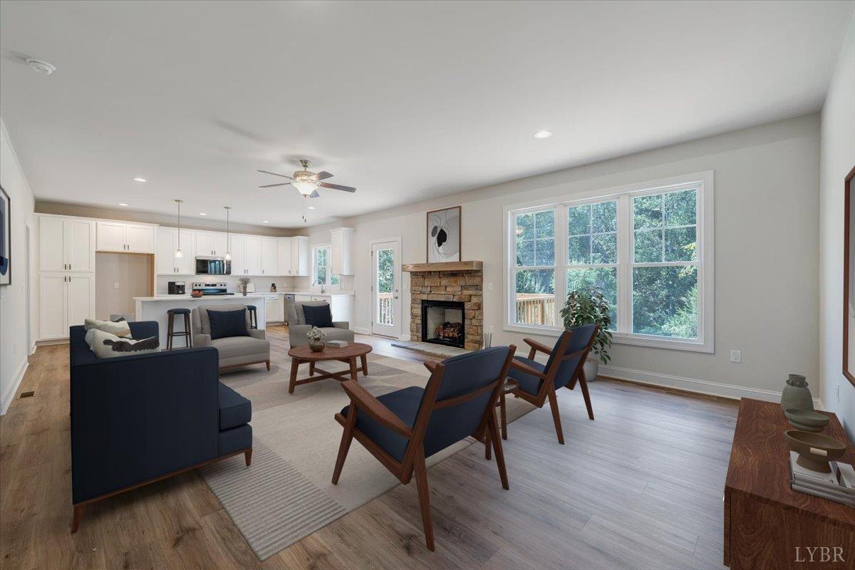1053 Snowfield Circle Lynchburg, VA 24503 - Photo 6 of 29 a living room with furniture fireplace and flat screen tv