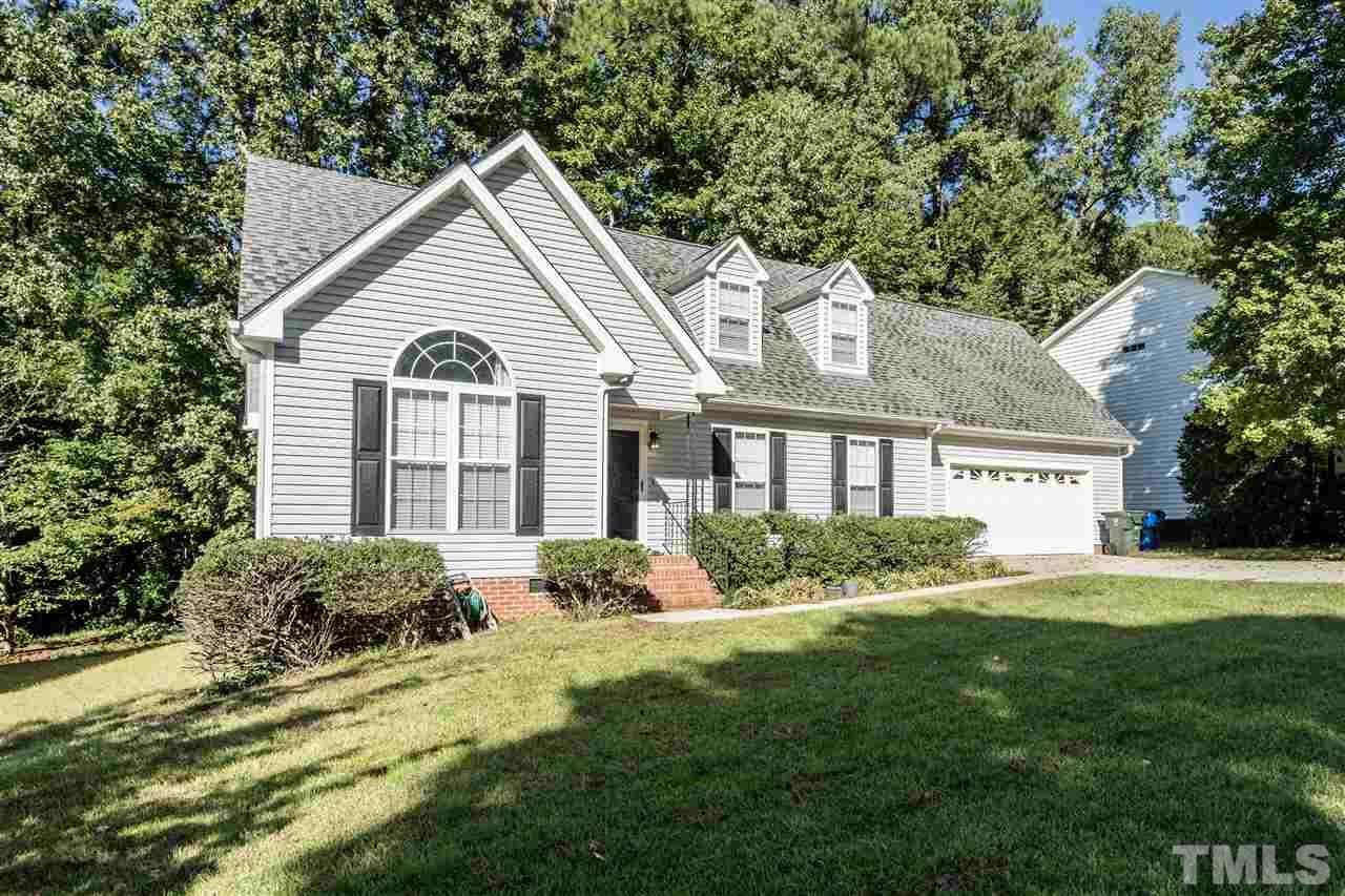104 Fieldspring Lane Raleigh, NC 27606 - Photo 3 of 3 a front view of a house with a yard
