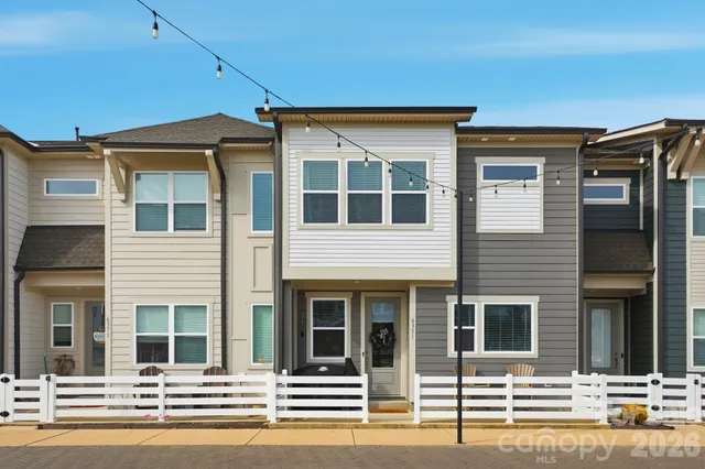 a front view of a house with a ocean view