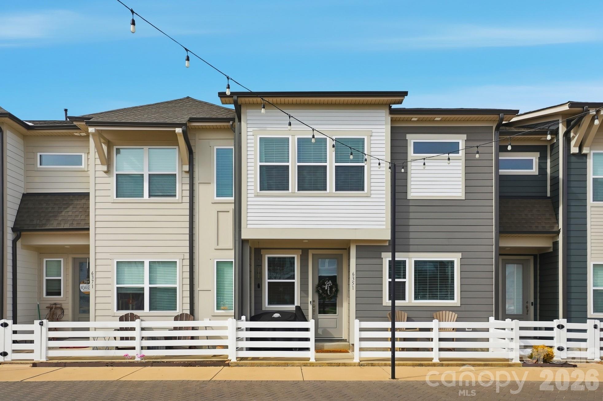 a front view of a house with a ocean view