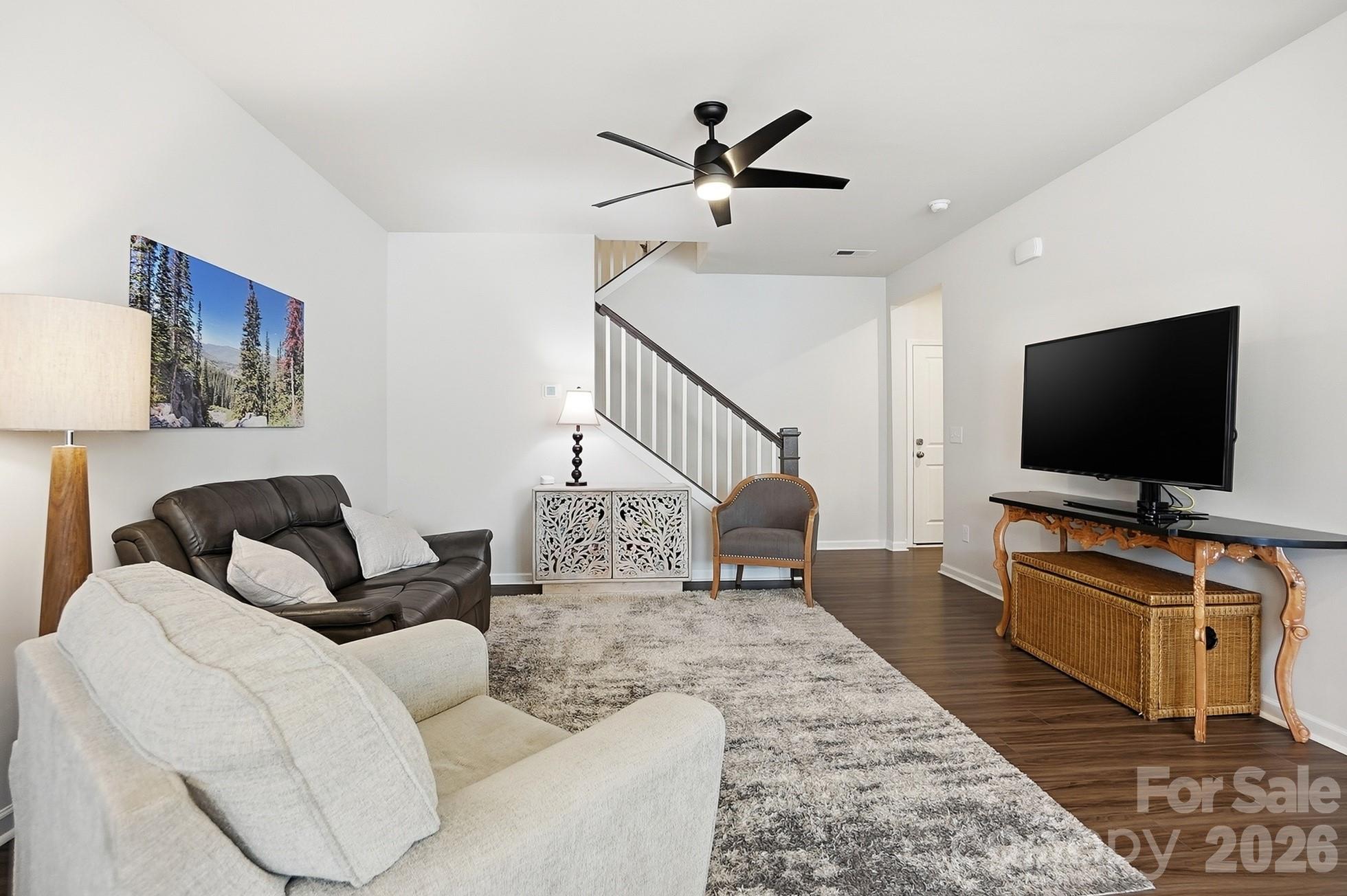6351 Lopez Court Kannapolis, NC 28081 - Photo 4 of 48 a living room with furniture and a flat screen tv