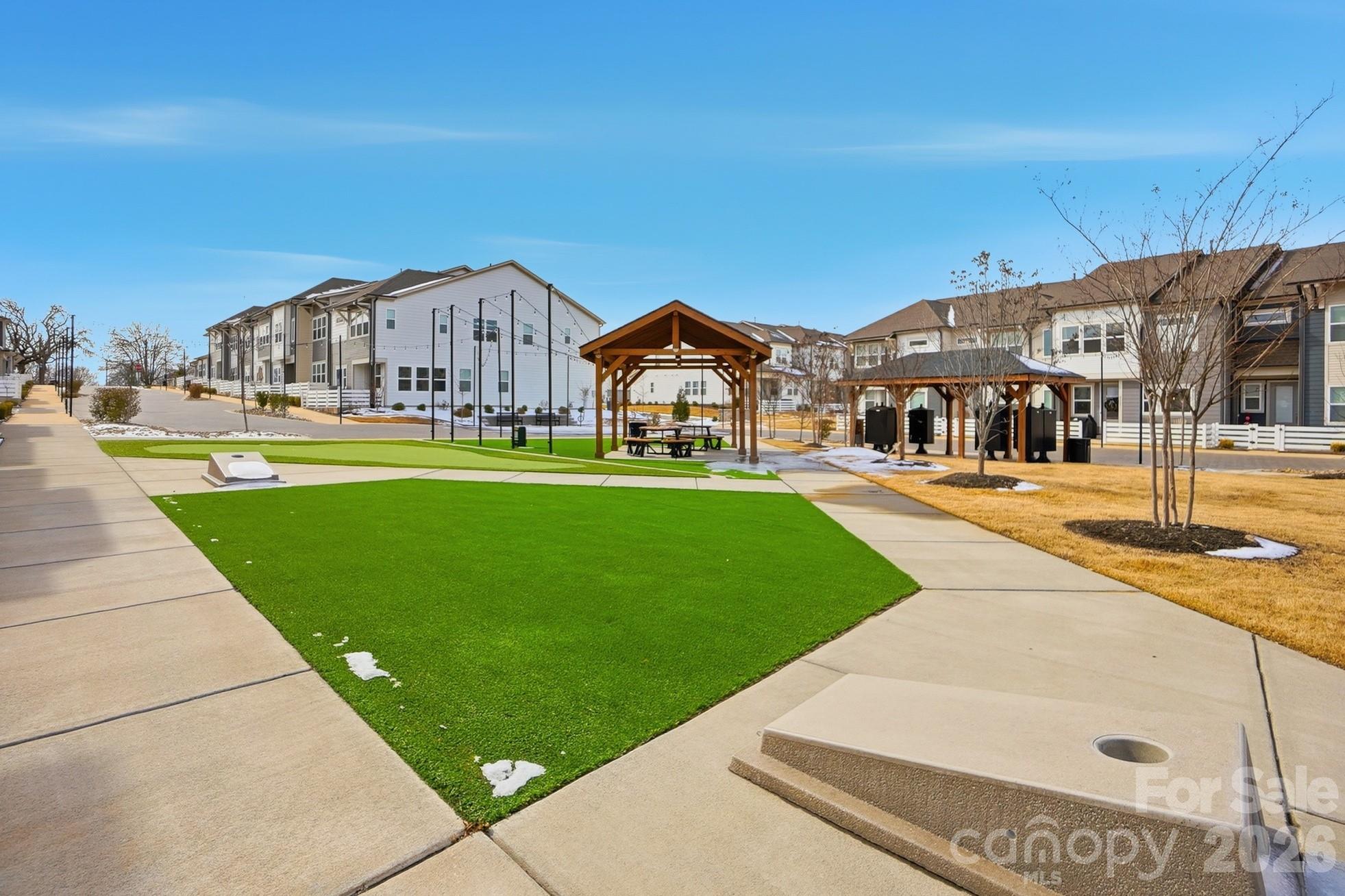 6351 Lopez Court Kannapolis, NC 28081 - Photo 42 of 48 a front view of house with yard and outdoor seating