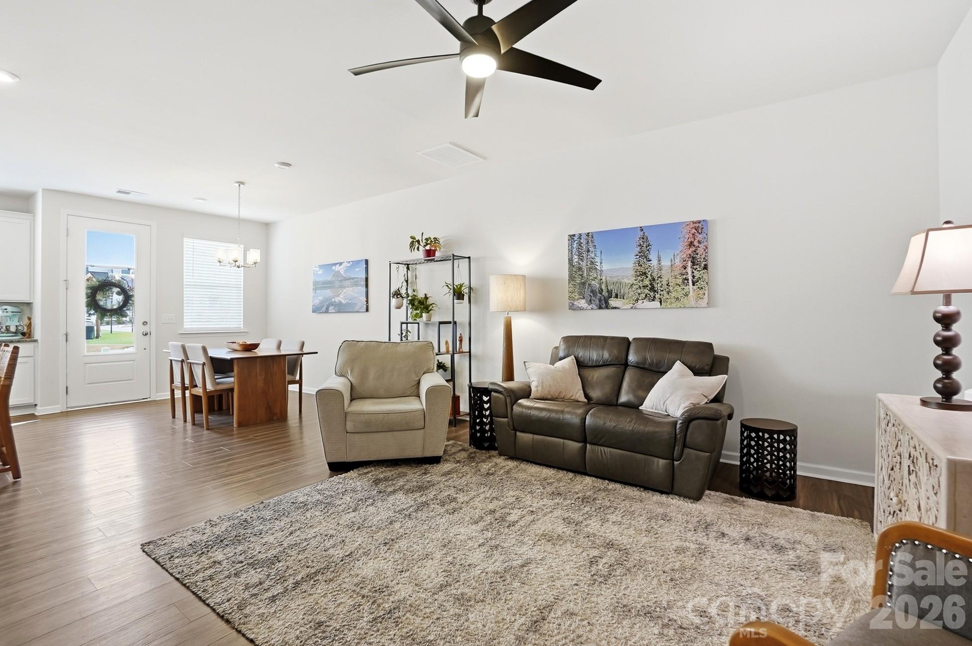 6351 Lopez Court Kannapolis, NC 28081 - Photo 6 of 48 a living room with furniture and a wooden floor