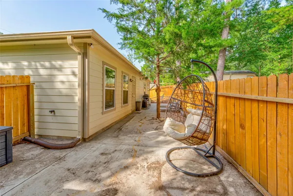 a view of porch with wooden floor and chair