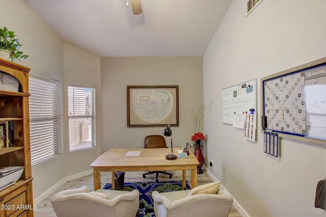 a bathroom with a sink double vanity and a mirror