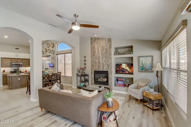 a kitchen with a stove a sink and a refrigerator