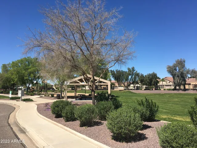a view of a yard with an outdoor space