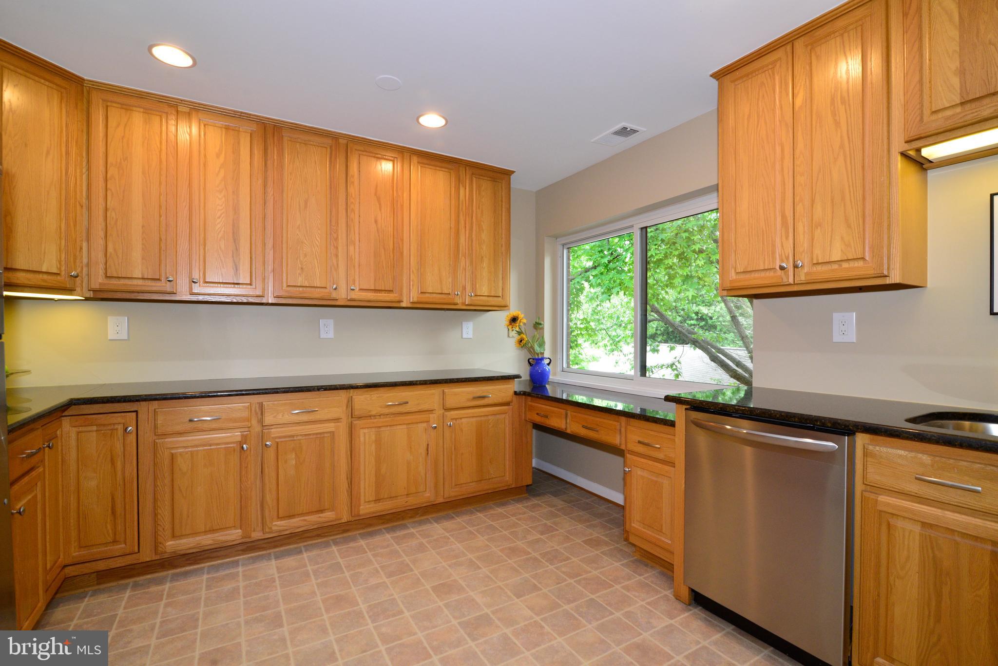 11128 Harbor Court Reston, VA 20191 - Photo 14 of 44 Great cabinet space and counter space!