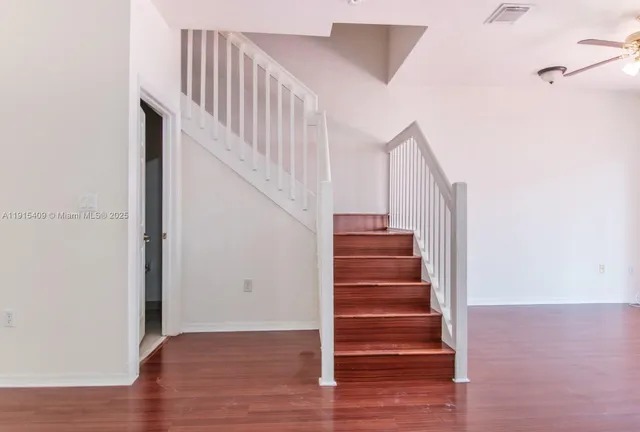 a view of entryway with wooden floor