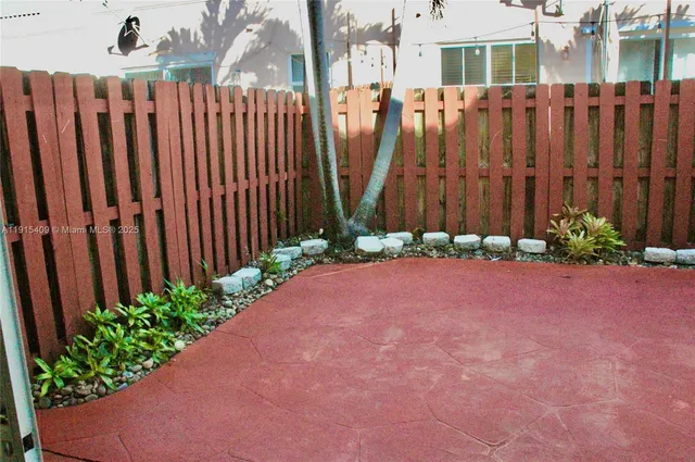 a view of a backyard with a garden