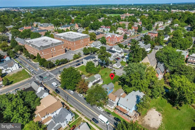 an aerial view of a city with lots of residential buildings