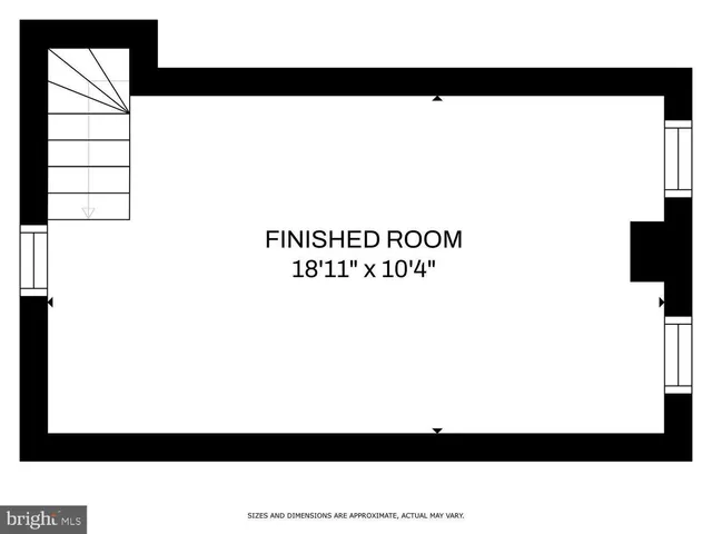 a picture of a living room with a white wall