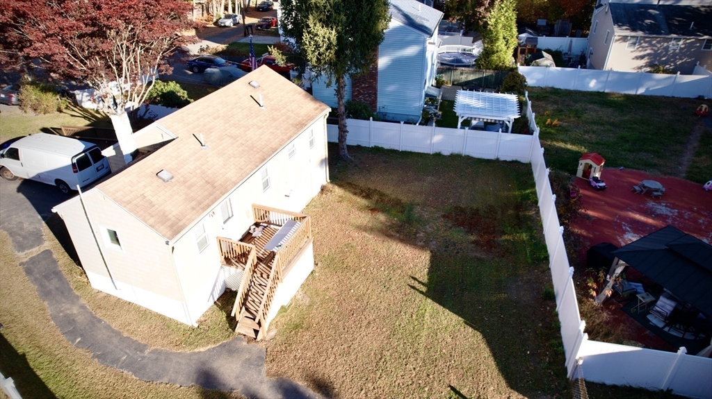 27 Overlook Road Holbrook, MA 02343 - Photo 19 of 25 a view of a house with a backyard